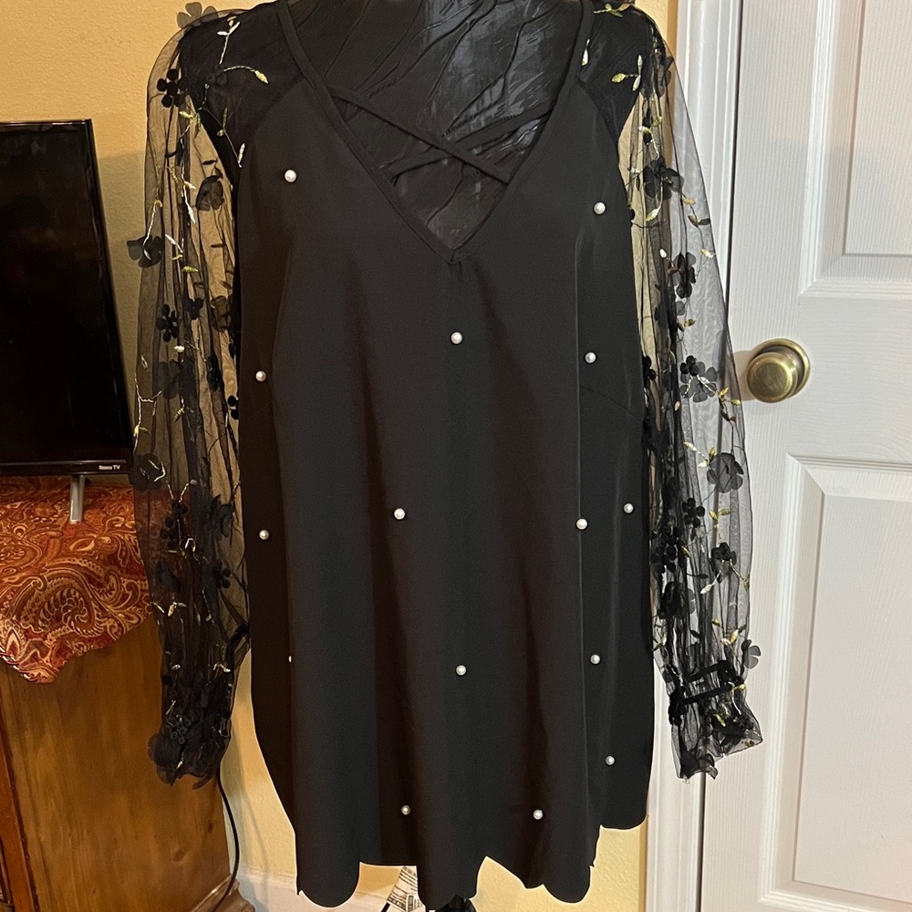 Elegant Black Blouse with Sheer Floral Sleeves